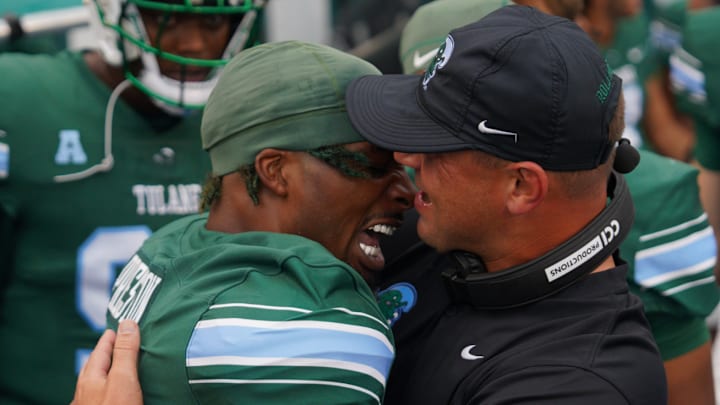 Tulane Green Wave head coach Jon Sumrall and wide receiver Shazz Preston celebrate together. Tulane Green Wave head coach Jon Sumrall and wide receiver Shazz Preston celebrate together.