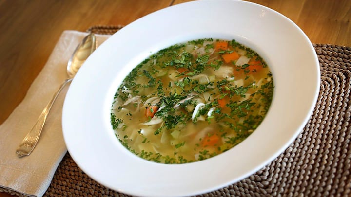 Poached chicken noodle soup with leeks, celery, carrots and herbs from Spoon Soup Co., owned by chef Martha Falvey, of Hingham, is shown on Wednesday, March 16, 2022.

031622 Gd Hin Soup14 Jpg