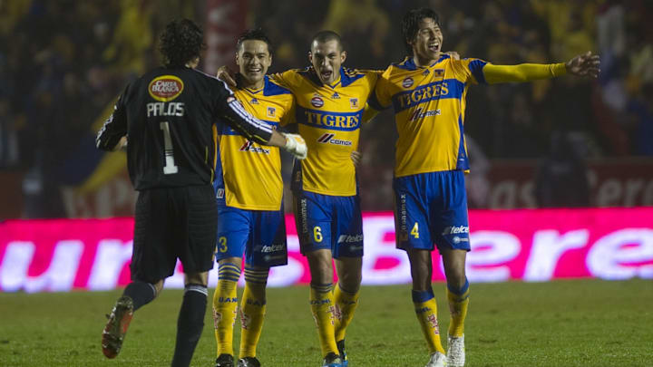 Players of Tigres (L-R) Goalkeeper Enriq