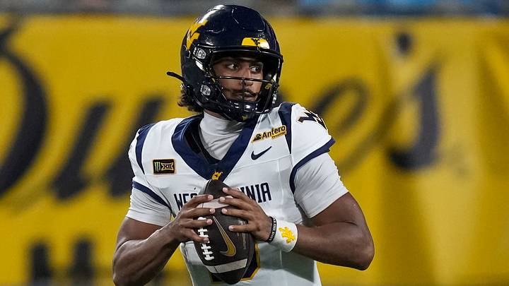 Sep 19, 2026; Charlotte, North Carolina, USA; West Virginia Mountaineers quarterback Michael Hawkins Jr. (3) looks to pass to the outside against the Virginia Cavaliers during the second quarter at Bank of America Stadium. Mandatory Credit: Jim Dedmon-Imagn Images Sep 19, 2026; Charlotte, North Carolina, USA; West Virginia Mountaineers quarterback Michael Hawkins Jr. (3) looks to pass to the outside against the Virginia Cavaliers during the second quarter at Bank of America Stadium. Mandatory Credit: Jim Dedmon-Imagn Images