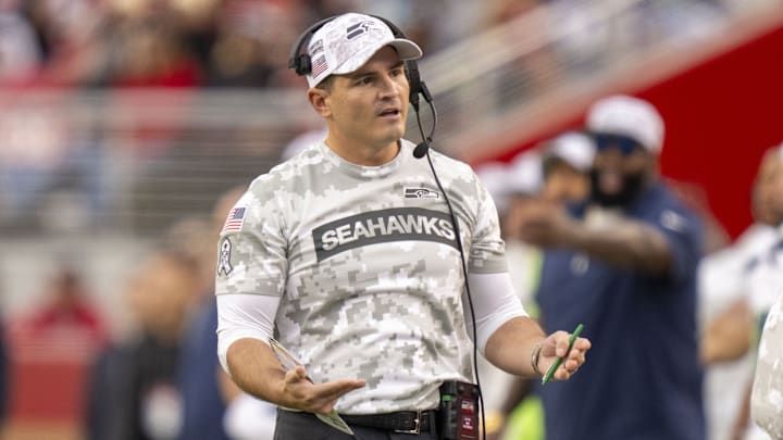 November 17, 2024; Santa Clara, California, USA; Seattle Seahawks head coach Mike Macdonald talks to his staff during the fourth quarter against the San Francisco 49ers at Levi's Stadium.