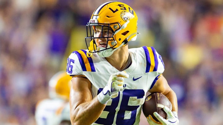 Mason Taylor 86 runs the ball as the LSU Tigers take on the Ole Miss Rebels at Tiger Stadium in Baton Rouge, Louisiana, on Oct. 12, 2024