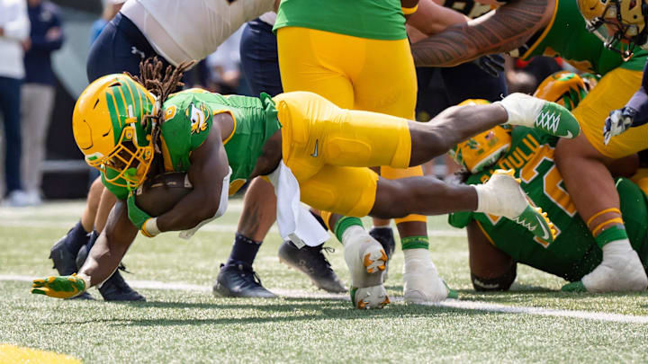 Oregon running back Noah Whittington dives into the end zone for a touchdown as the Oregon Ducks host the Montana State Bobcats on Aug. 30, 2025, at Autzen Stadium in Eugene, Oregon.