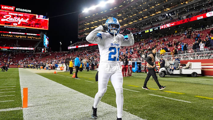 Detroit Lions cornerback Amik Robertson (21) celebrates a 40-34 win over San Francisco 49ers as he exits the field at Levi's Stadium in Santa Clara, Calif. on Monday, Dec. 30, 2024. Detroit Lions cornerback Amik Robertson (21) celebrates a 40-34 win over San Francisco 49ers as he exits the field at Levi's Stadium in Santa Clara, Calif. on Monday, Dec. 30, 2024.