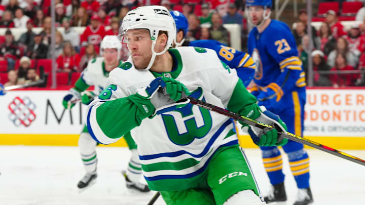 Feb 27, 2025; Raleigh, North Carolina, USA;  Carolina Hurricanes right wing Mikko Rantanen (96) skates against the Buffalo Sabres during the first period at Lenovo Center. Mandatory Credit: James Guillory-Imagn Images