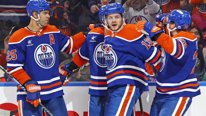The Edmonton Oilers celebrate a goal scored by forward Adam Henrique (19)
