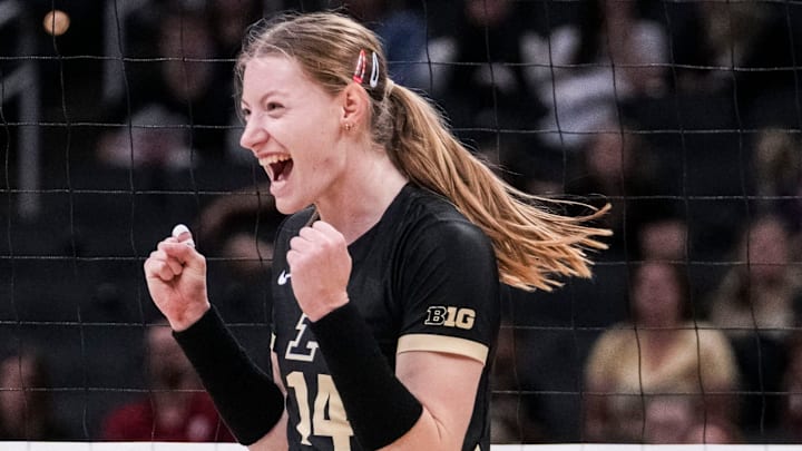 Purdue Boilermakers opposite Grace Heaney (14) celebrates 