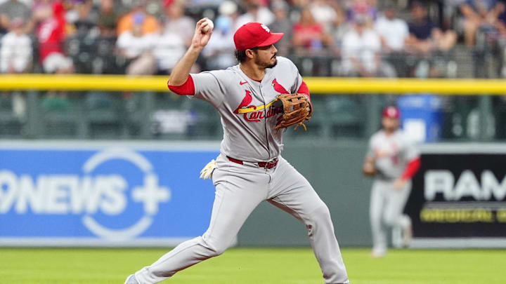 Jul 22, 2025; Denver, Colorado, USA; St. Louis Cardinals third baseman Nolan Arenado (28) fields the ball in the first inning against the Colorado Rockies at Coors Field. Mandatory Credit: Ron Chenoy-Imagn Images Jul 22, 2025; Denver, Colorado, USA; St. Louis Cardinals third baseman Nolan Arenado (28) fields the ball in the first inning against the Colorado Rockies at Coors Field. Mandatory Credit: Ron Chenoy-Imagn Images