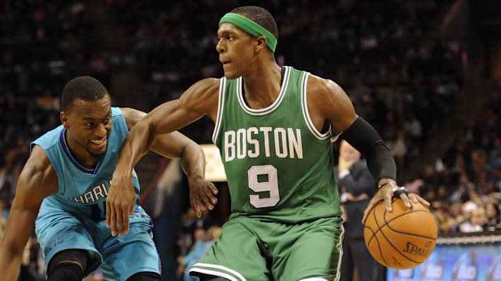 Dec 10, 2014; Charlotte, NC, USA; Boston Celtics guard Rajon Rondo (9) drives against Charlotte Hornets guard Kemba Walker (15) during the second half of the game at Time Warner Cable Arena. Hornets win 96-87. Mandatory Credit: Sam Sharpe-Imagn Images