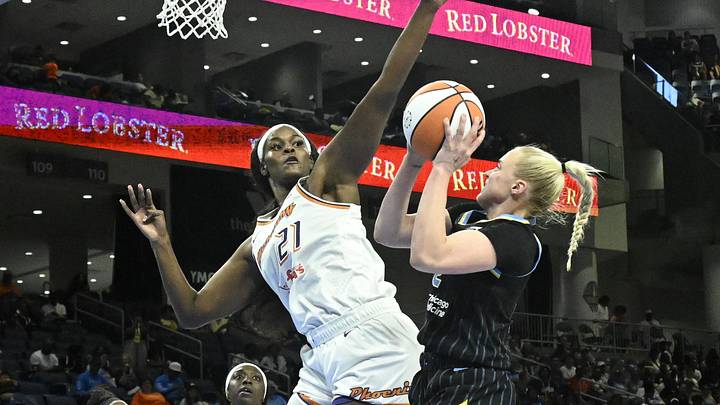 Jun 21, 2025; Chicago, Illinois, USA; Phoenix Mercury center Kalani Brown (21) defends against Chicago Sky guard Hailey Van Lith (2) during the second half at Wintrust Arena. Mandatory Credit: Matt Marton-Imagn Images