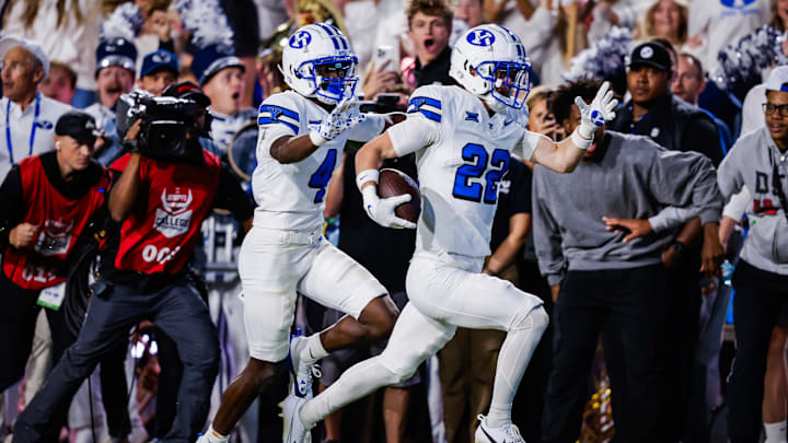 BYU safety Tommy Prassas returns a fumble for a touchdown against No. 13 Kansas State