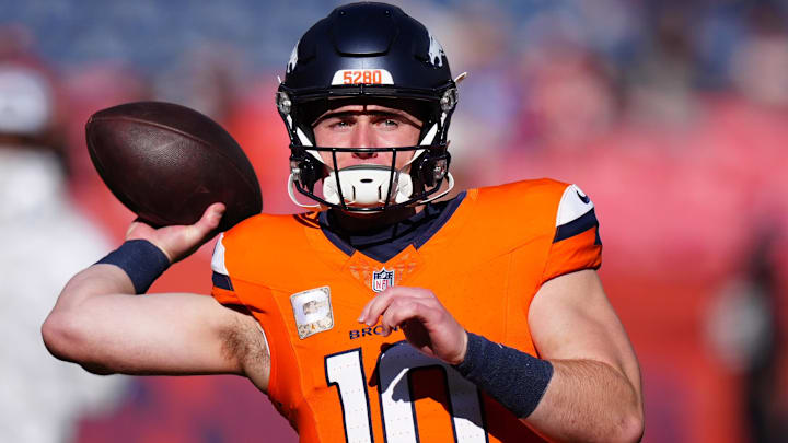 Nov 17, 2024; Denver, Colorado, USA;  Denver Broncos quarterback Bo Nix (10) warms before the game against the Atlanta Falcons at Empower Field at Mile High. 