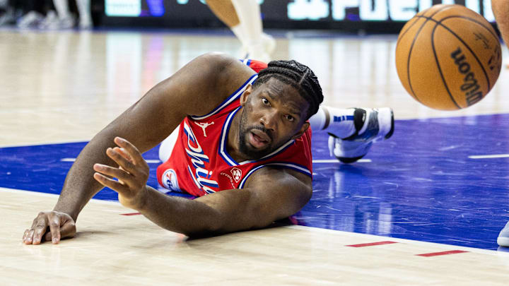 Apr 12, 2024; Philadelphia, Pennsylvania, USA; Philadelphia 76ers center Joel Embiid (21) watches a