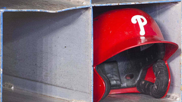 Aug 25, 2018; Toronto, Ontario, CAN; A Philadelphia Phillies batting helmet sits in the dugout during batting practice before a game against the Toronto Blue Jays at Rogers Centre. Mandatory Credit: Nick Turchiaro-Imagn Images