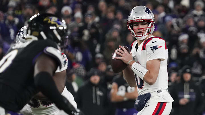 Dec 21, 2025; Baltimore, Maryland, USA;  New England Patriots quarterback Drake Maye (10) looks to pass against the Baltimore Ravens during the first quarter of the game at M&T Bank Stadium. Mandatory Credit: James Lang-Imagn Images
