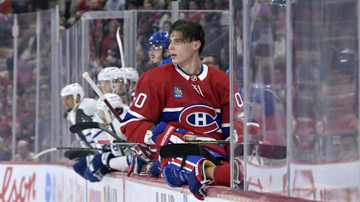 Oct 9, 2024; Montreal, Quebec, CAN; Montreal Canadiens forward Juraj Slafkovsky (20) returns to the bench after losing his helmet during the third period of the game against the Toronto Maple Leafs at the Bell Centre. Mandatory Credit: Eric Bolte-Imagn Images