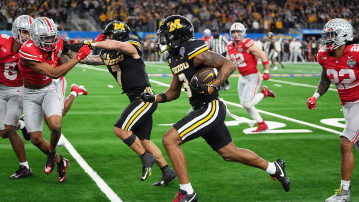 Dec 29, 2023; Arlington, Texas, USA; Missouri Tigers wide receiver Luther Burden III (3) runs upfield during the fourth quarter of the Goodyear Cotton Bowl Classic against the Ohio State Buckeyes at AT&T Stadium. Dec 29, 2023; Arlington, Texas, USA; Missouri Tigers wide receiver Luther Burden III (3) runs upfield during the fourth quarter of the Goodyear Cotton Bowl Classic against the Ohio State Buckeyes at AT&T Stadium.