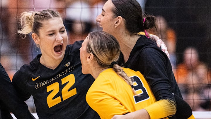 Missouri Tigers setter Marina Crownover (22), a former Texas Longhorn, reacts with her teammates, including middle blocker Morgan Isenberg (9) after scoring a point during the Longhorns' match-up with the Missouri Tigers at the Gregory Gym in Austin, Nov. 1, 2024. Missouri Tigers setter Marina Crownover (22), a former Texas Longhorn, reacts with her teammates, including middle blocker Morgan Isenberg (9) after scoring a point during the Longhorns' match-up with the Missouri Tigers at the Gregory Gym in Austin, Nov. 1, 2024.