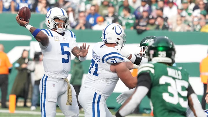 Nov 17, 2024; East Rutherford, New Jersey, USA; Indianapolis Colts quarterback Anthony Richardson (5) throws against the New York Jets during the first half at MetLife Stadium. Mandatory Credit: Robert Deutsch-Imagn Images