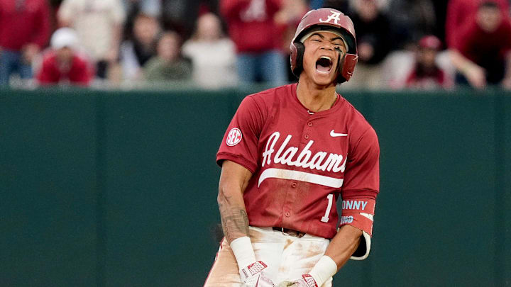 Feb 14, 2025; Tuscaloosa, AL, USA; Justin Lebron celebrates at second after hitting a three-run double during Alabama baseball’s opening day at Sewell-Thomas Stadium against Bradley. The Crimson Tide defeated Bradley 10-6.