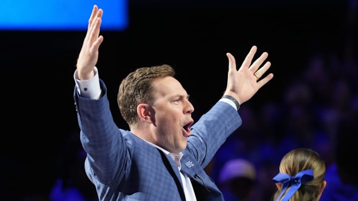 Kentucky’s new football coach Will Stein gets pumped that he is the Y in Kentucky against North Carolina in Rupp Arena.
Dec. 2, 2025