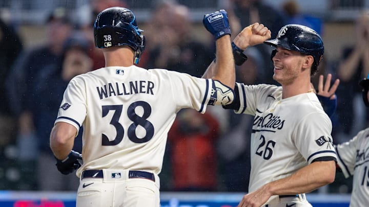 Sep 26, 2023; Minneapolis, Minnesota, USA; Minnesota Twins left fielder Matt Wallner (38) celebrates with Minnesota Twins right fielder Max Kepler (26) after hitting a grand slam against the Oakland Athletics in the first inning at Target Field. Mandatory Credit: Jesse Johnson-USA TODAY Sports