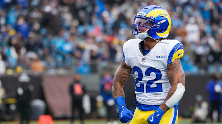 Nov 30, 2025; Charlotte, North Carolina, USA; Los Angeles Rams running back Blake Corum (22) celebrates after scoring a touchdown during the second quarter against the Carolina Panthers at Bank of America Stadium. Mandatory Credit: Jim Dedmon-Imagn Images