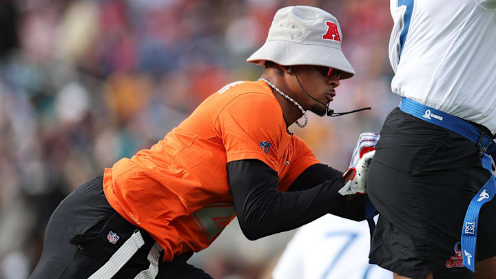 Feb 4, 2024; Orlando, FL, USA; AFC cornerback Pat Surtain II (2) of the Denver Broncos sacks NFC quarterback Geno Smith (7) during the 2024 Pro Bowl at Camping World Stadium. 