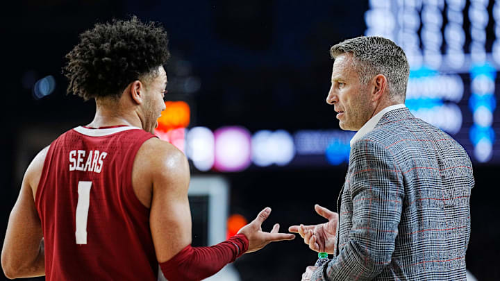 Alabama guard Mark Sears (1) talks with head coach Nate Oats during the Final Four semifinal game against Connecticut at State Farm Stadium. Alabama guard Mark Sears (1) talks with head coach Nate Oats during the Final Four semifinal game against Connecticut at State Farm Stadium.