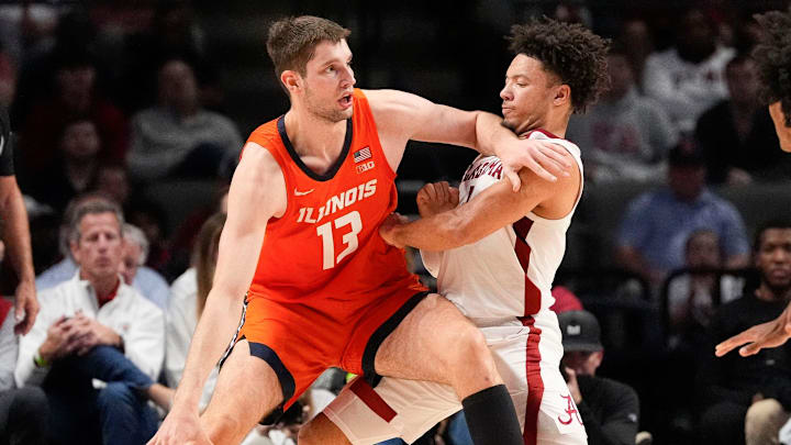 Nov 20, 2024; Birmingham, AL, USA; Illinois center Tomislav Ivisic (13) attempts to drive against Alabama guard Mark Sears (1) but Sears holds his ground in the CM Newton Classic at Legacy Arena. Alabama defeated Illinois 100-87. Mandatory Credit: Gary Cosby Jr.-Tuscaloosa News Nov 20, 2024; Birmingham, AL, USA; Illinois center Tomislav Ivisic (13) attempts to drive against Alabama guard Mark Sears (1) but Sears holds his ground in the CM Newton Classic at Legacy Arena. Alabama defeated Illinois 100-87. Mandatory Credit: Gary Cosby Jr.-Tuscaloosa News