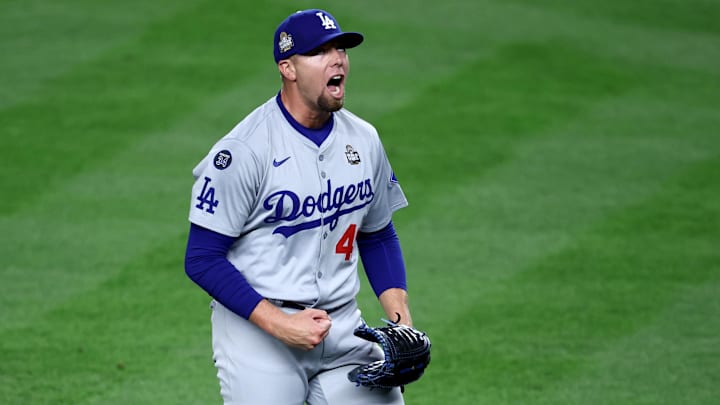 Oct 30, 2024; New York, New York, USA; Los Angeles Dodgers pitcher Blake Treinen (49) celebrates after the end of the eighth inning against the New York Yankees in game five of the 2024 MLB World Series at Yankee Stadium.