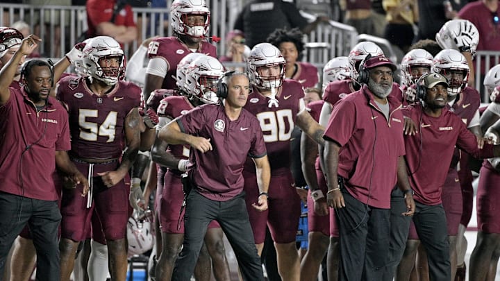 Sep 21, 2024; Tallahassee, Florida, USA; Florida State Seminoles head coach Mike Norvell and his team watch the time tick off of the clock during the fourth quarter against the California Golden Bears at Doak S. Campbell Stadium. Mandatory Credit: Melina Myers-Imagn Images