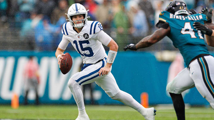 Dec 7, 2025; Jacksonville, Florida, USA; Indianapolis Colts quarterback Riley Leonard (15) runs with the ball while being chased by Jacksonville Jaguars defensive end Josh Hines-Allen (41) during the first half at EverBank Stadium. Mandatory Credit: Matt Pendleton-Imagn Images Dec 7, 2025; Jacksonville, Florida, USA; Indianapolis Colts quarterback Riley Leonard (15) runs with the ball while being chased by Jacksonville Jaguars defensive end Josh Hines-Allen (41) during the first half at EverBank Stadium. Mandatory Credit: Matt Pendleton-Imagn Images