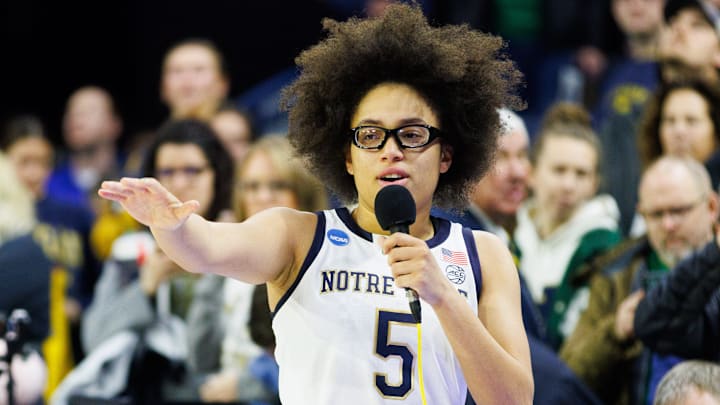 Notre Dame guard Olivia Miles addresses the crowd after winning the second round of the NCAA Women's Basketball Tournament 76-55 against Michigan at Purcell Pavilion on Sunday, March 23, 2025, in South Bend. Notre Dame guard Olivia Miles addresses the crowd after winning the second round of the NCAA Women's Basketball Tournament 76-55 against Michigan at Purcell Pavilion on Sunday, March 23, 2025, in South Bend.