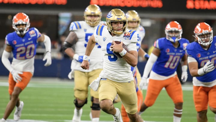 Dec 16, 2023; Inglewood, CA, USA; UCLA Bruins quarterback Collin Schlee (9) scrambles out of the pocket and heads toward the endzone against the Boise State Broncos during the third quarter of the Starco Brands LA Bowl at SoFi Stadium. Mandatory Credit: Robert Hanashiro-Imagn Images Dec 16, 2023; Inglewood, CA, USA; UCLA Bruins quarterback Collin Schlee (9) scrambles out of the pocket and heads toward the endzone against the Boise State Broncos during the third quarter of the Starco Brands LA Bowl at SoFi Stadium. Mandatory Credit: Robert Hanashiro-Imagn Images