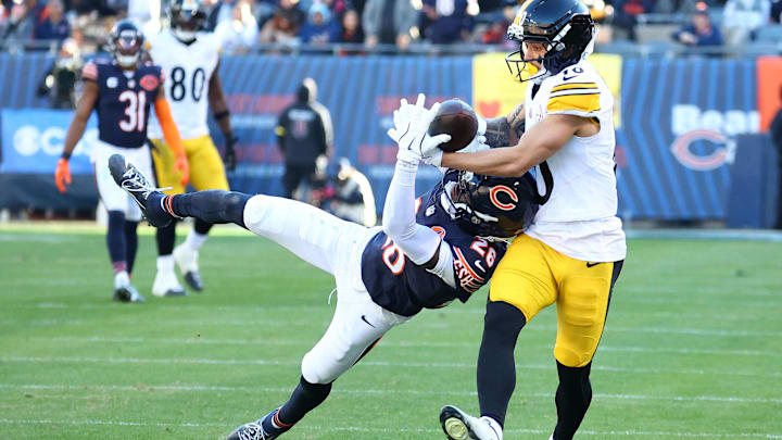Cornerback Nahshon Wright breaks up a pass against Pittsburgh Steelers wide receiver Roman Wilson.