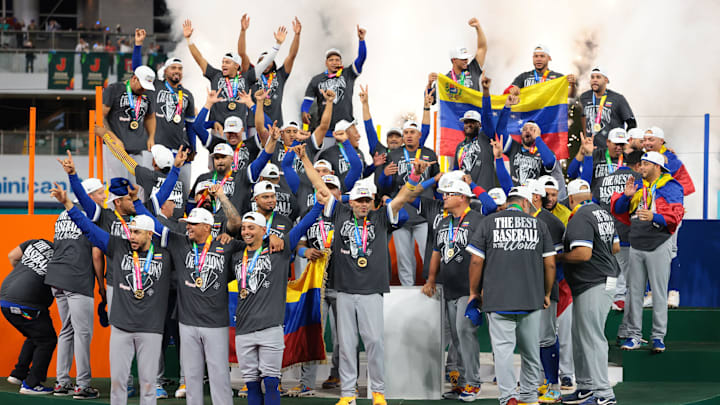 Mar 17, 2026; Miami, FL, United States; Venezuela reacts on the stage after defeating the United States during the 2026 World Baseball Classic Championship game at loanDepot Park. Mandatory Credit: Sam Navarro-Imagn Images