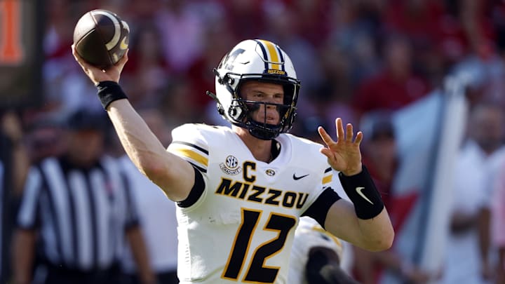 Oct 26, 2024; Tuscaloosa, Alabama, USA;  Missouri Tigers quarterback Brady Cook (12) throws a pass during the first half against the Alabama Crimson Tide at Bryant-Denny Stadium. Mandatory Credit: Butch Dill-Imagn Images
