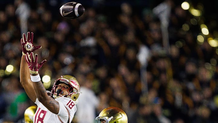 Notre Dame linebacker Jack Kiser (24) disturbs a reception attempt by Florida State tight end Landen Thomas (18) during a NCAA college football game at Notre Dame Stadium on Saturday, Nov. 9, 2024, in South Bend.