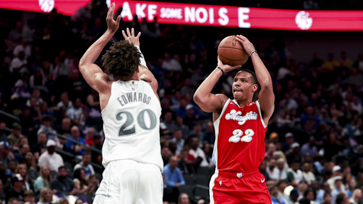 Mar 7, 2025; Dallas, Texas, USA; Memphis Grizzlies guard Desmond Bane (22) shoots over Dallas Mavericks forward Kessler Edwards (20) during the first half at American Airlines Center. Mandatory Credit: Kevin Jairaj-Imagn Images