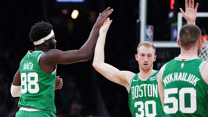 Apr 12, 2024; Boston, Massachusetts, USA; Boston Celtics forward Sam Hauser (30) and center Neemias Queta (88) react during a break in the action against the Charlotte Hornets in the second quarter at TD Garden. Mandatory Credit: David Butler II-Imagn Images Apr 12, 2024; Boston, Massachusetts, USA; Boston Celtics forward Sam Hauser (30) and center Neemias Queta (88) react during a break in the action against the Charlotte Hornets in the second quarter at TD Garden. Mandatory Credit: David Butler II-Imagn Images
