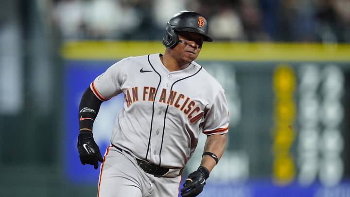 May 29, 2026; Denver, Colorado, USA; San Francisco Giants first baseman Rafael Devers (16) runs out a triple in the ninth inning against the Colorado Rockies at Coors Field. Mandatory Credit: Ron Chenoy-Imagn Images