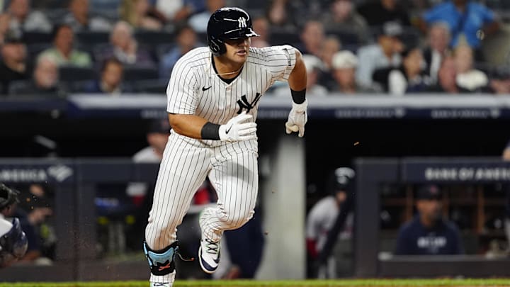 Sep 12, 2024; Bronx, New York, USA; New York Yankees left fielder Jasson Dominguez (89) runs out a single against the Boston Red Sox during the second inning at Yankee Stadium. Mandatory Credit: Gregory Fisher-Imagn Images