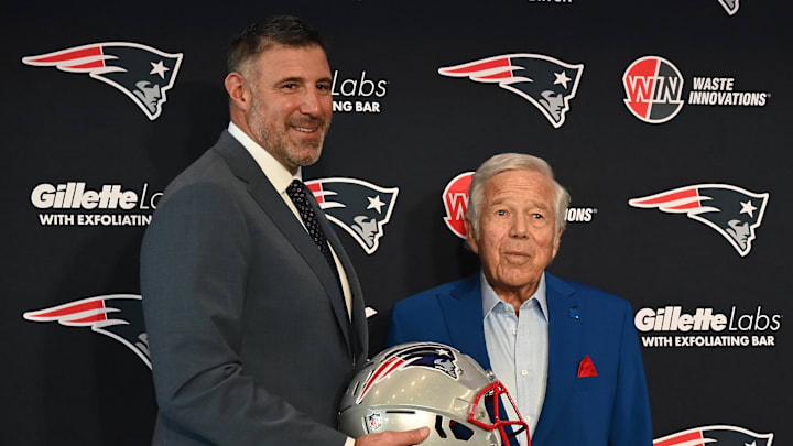 Jan 13, 2025; Foxborough, MA, USA; Mike Vrabel (left) poses for a photo with New England Patriots owner Robert Kraft (right) after a press conference at Gillette Stadium to introduce him as the Patriots new head coach. Mandatory Credit: Eric Canha-Imagn Images