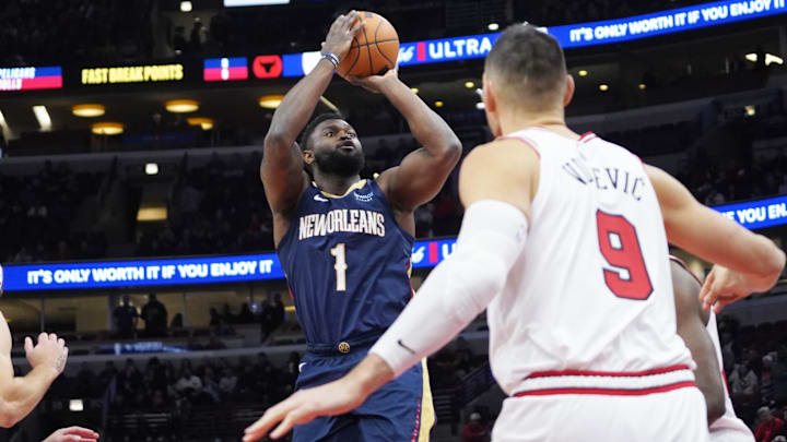 Jan 14, 2025; Chicago, Illinois, USA; Chicago Bulls center Nikola Vucevic (9) defends New Orleans Pelicans forward Zion Williamson (1) during the first quarter at United Center. Mandatory Credit: David Banks-Imagn Images Jan 14, 2025; Chicago, Illinois, USA; Chicago Bulls center Nikola Vucevic (9) defends New Orleans Pelicans forward Zion Williamson (1) during the first quarter at United Center. Mandatory Credit: David Banks-Imagn Images