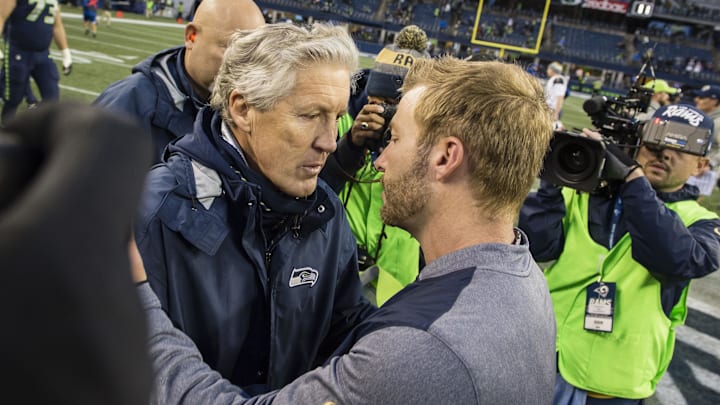 Dec 17, 2017; Seattle, WA, USA; Seattle Seahawks head coach Pete Carroll meets with Los Angeles Rams head coach Sean McVay at CenturyLink Field. The Rams won 42-7. Mandatory Credit: Troy Wayrynen-Imagn Images