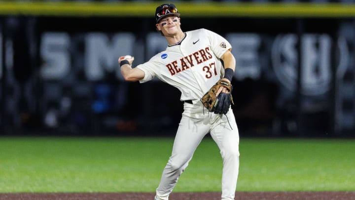 Jun 9, 2024; Lexington, KY, USA; Oregon State Beavers infielder Travis Bazzana (37) throws the ball during the second inning against the Kentucky Wildcats at Kentucky Proud Park. Mandatory Credit: Jordan Prather-USA TODAY Sports