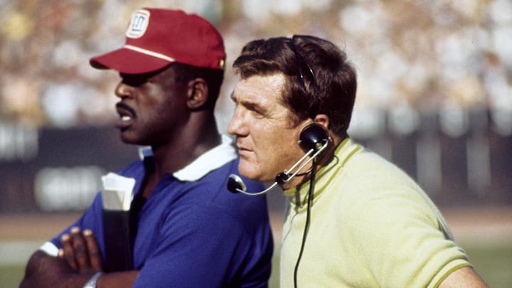 Oct 12, 1969; Bronx, NY, USA;  New York Giants head coach Alex Webster (right) and assistant coach Roosevelt Brown on the sideline against the Pittsburgh Steelers at Yankee Stadium.  