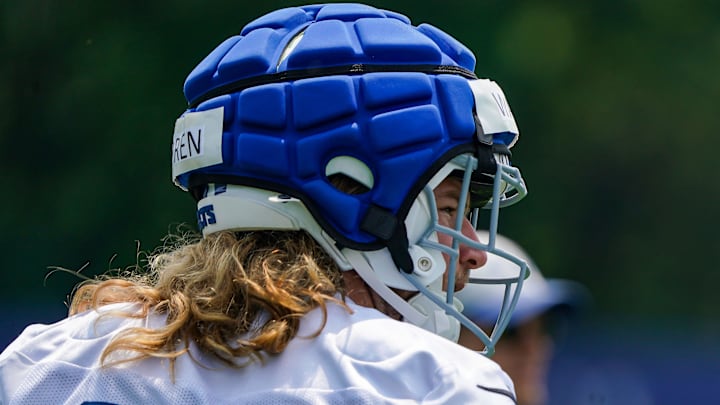 Indianapolis Colts tight end Tyler Warren (84) walks off the field Tuesday, June 10, 2025, during NFL Colts mandatory mini camp at the Indiana Farm Bureau Football Center in Indianapolis.