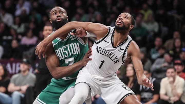 Feb 13, 2024; Brooklyn, New York, USA; Boston Celtics guard Jaylen Brown (7) and Brooklyn Nets forward Mikal Bridges (1) box out for a rebound in the second quarter at Barclays Center. Mandatory Credit: Wendell Cruz-Imagn Images Feb 13, 2024; Brooklyn, New York, USA; Boston Celtics guard Jaylen Brown (7) and Brooklyn Nets forward Mikal Bridges (1) box out for a rebound in the second quarter at Barclays Center. Mandatory Credit: Wendell Cruz-Imagn Images